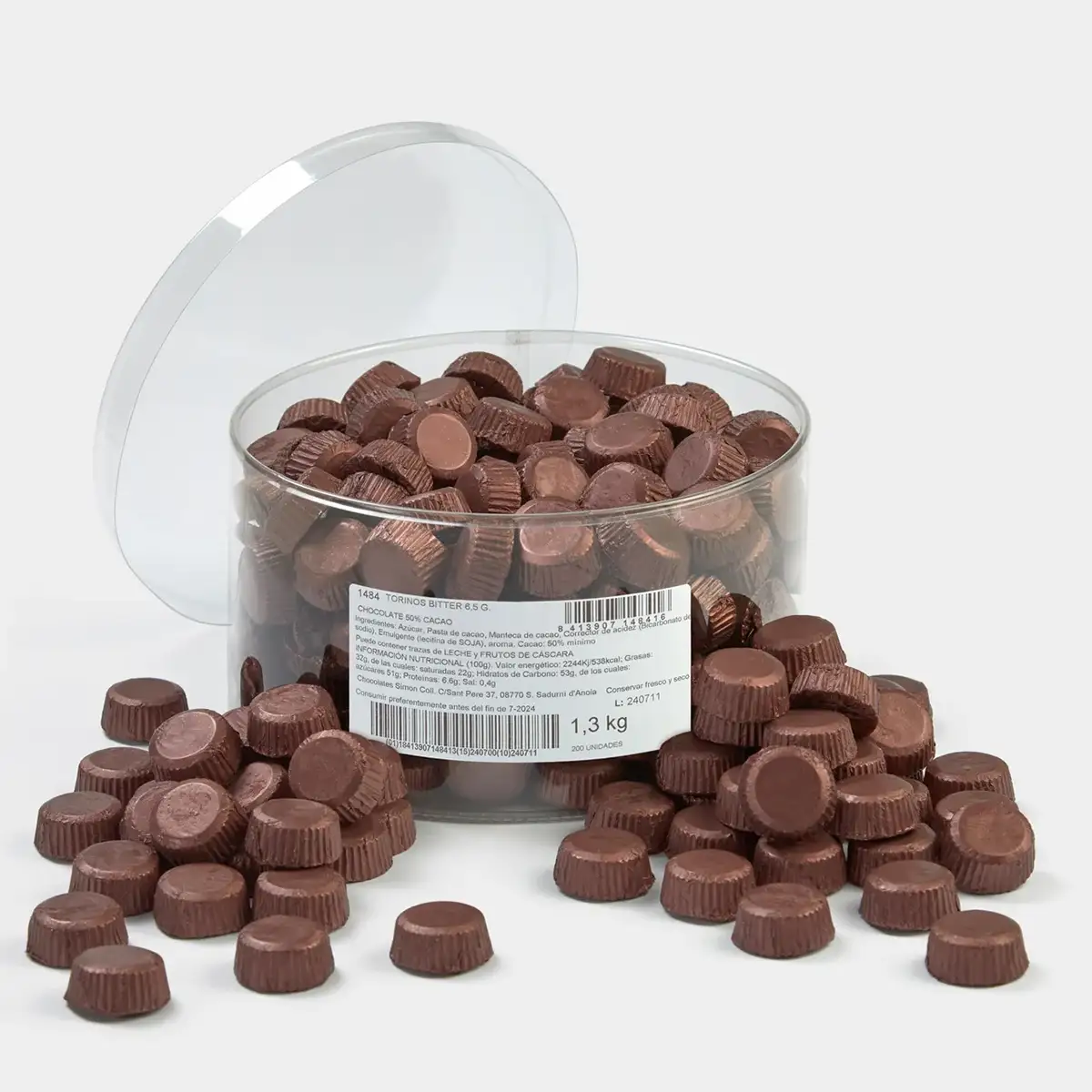 Bodegón de bombones de chocolate de la marca Simón Coll apilados